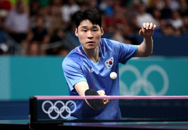 王皓:从“千年老二”到金牌教练的逆袭之路